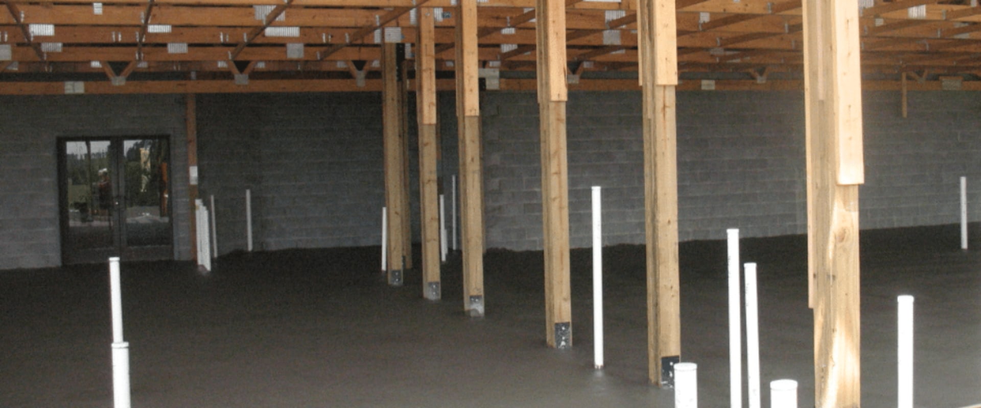 Do you set pole barn post in concrete?